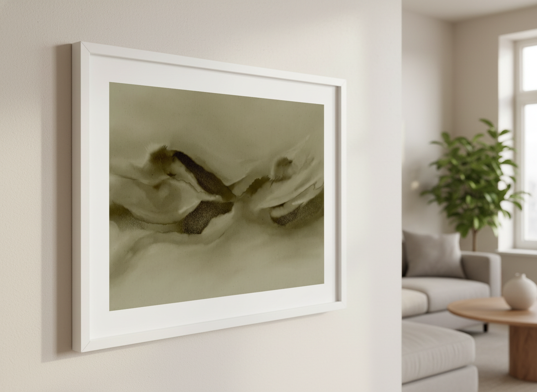 Modern wall art styled above a sofa in a neutral living room