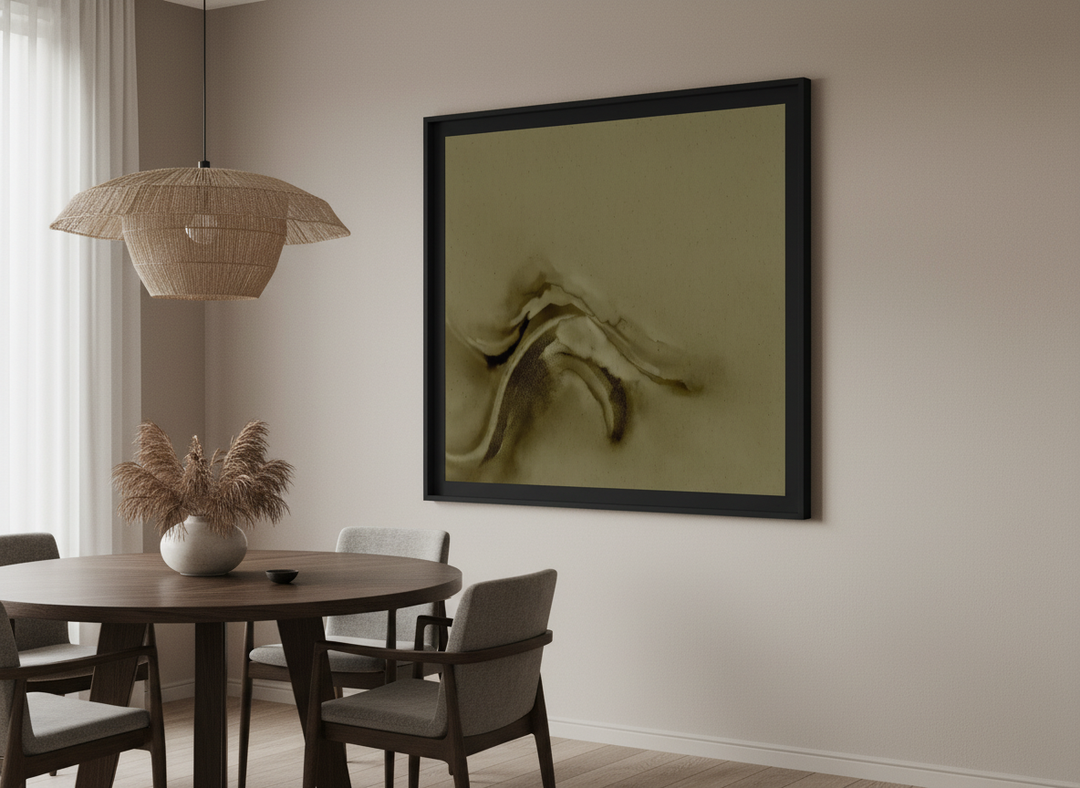 Wall art styled above a dining table in a contemporary home