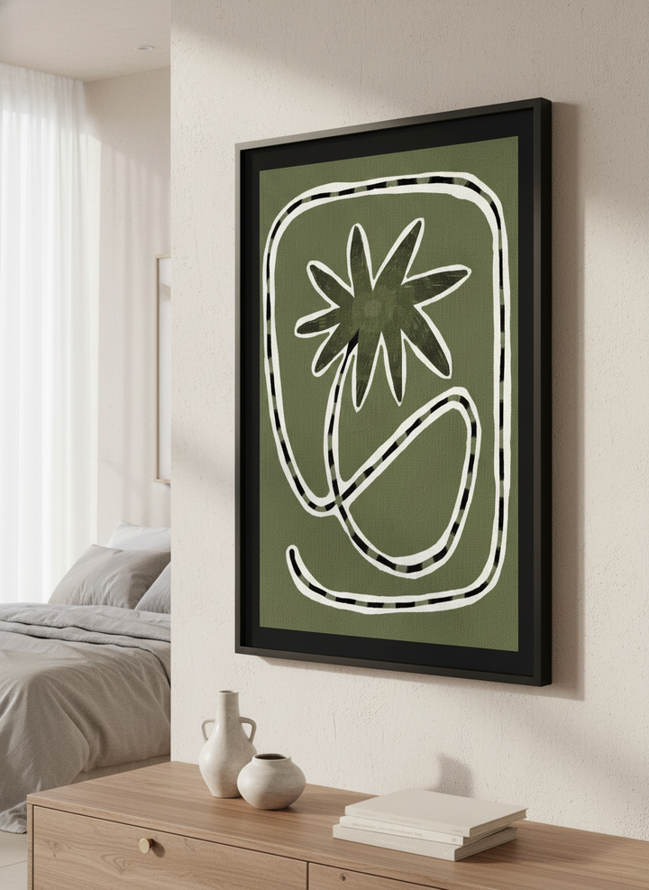 Minimalist artwork displayed in a calm, light-filled bedroom interior