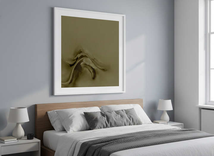 Minimalist artwork displayed in a calm, light-filled bedroom interior