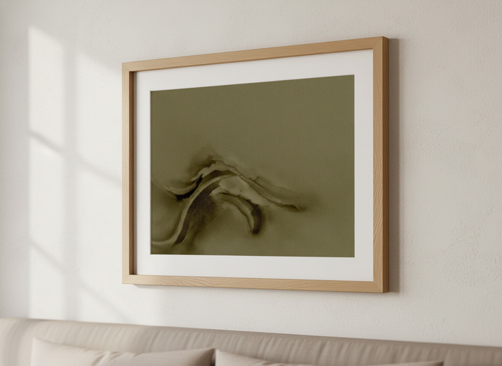 Minimalist artwork displayed in a calm, light-filled bedroom interior