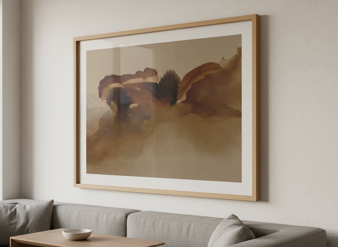 Modern wall art styled above a sofa in a neutral living room