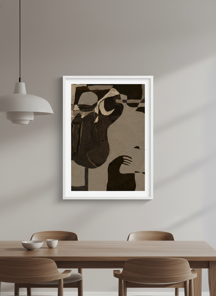 Wall art styled above a dining table in a contemporary home