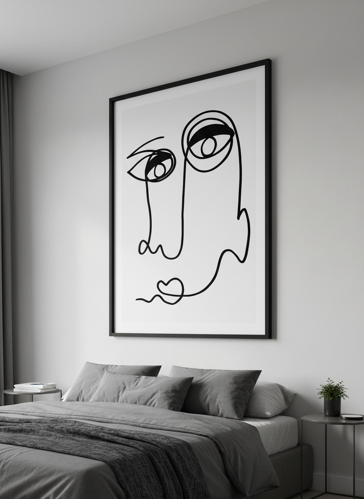 Minimalist artwork displayed in a calm, light-filled bedroom interior