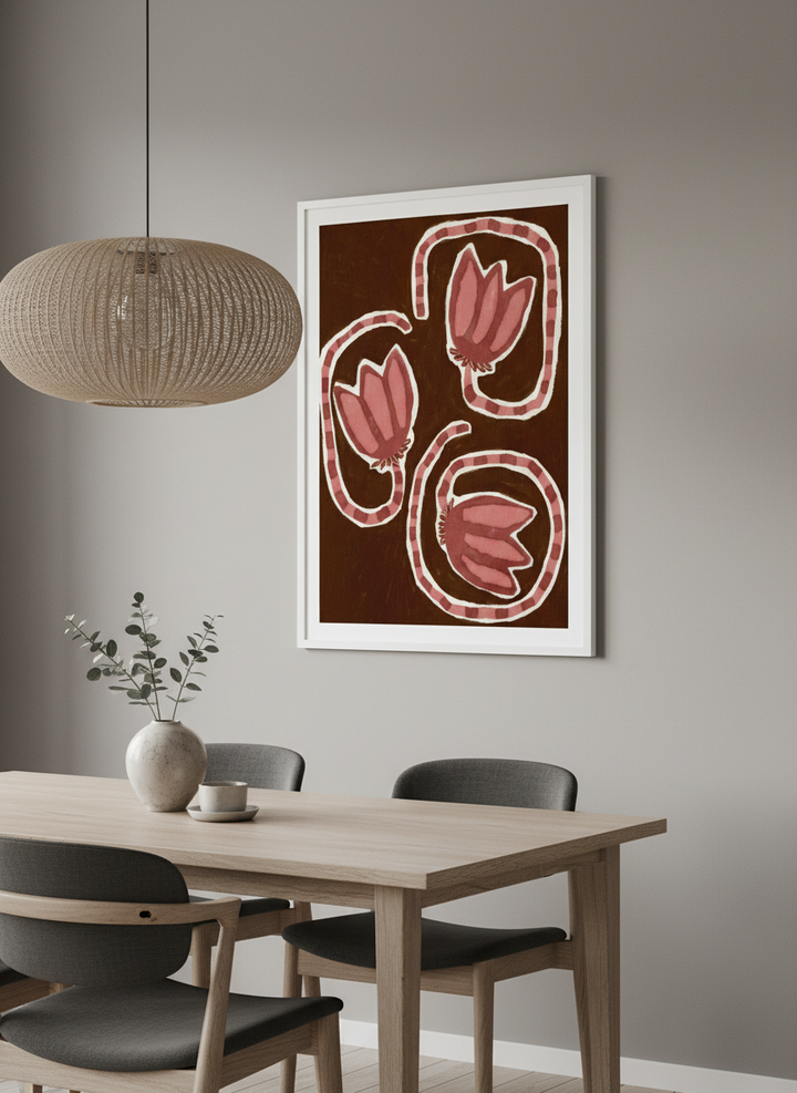 Wall art styled above a dining table in a contemporary home