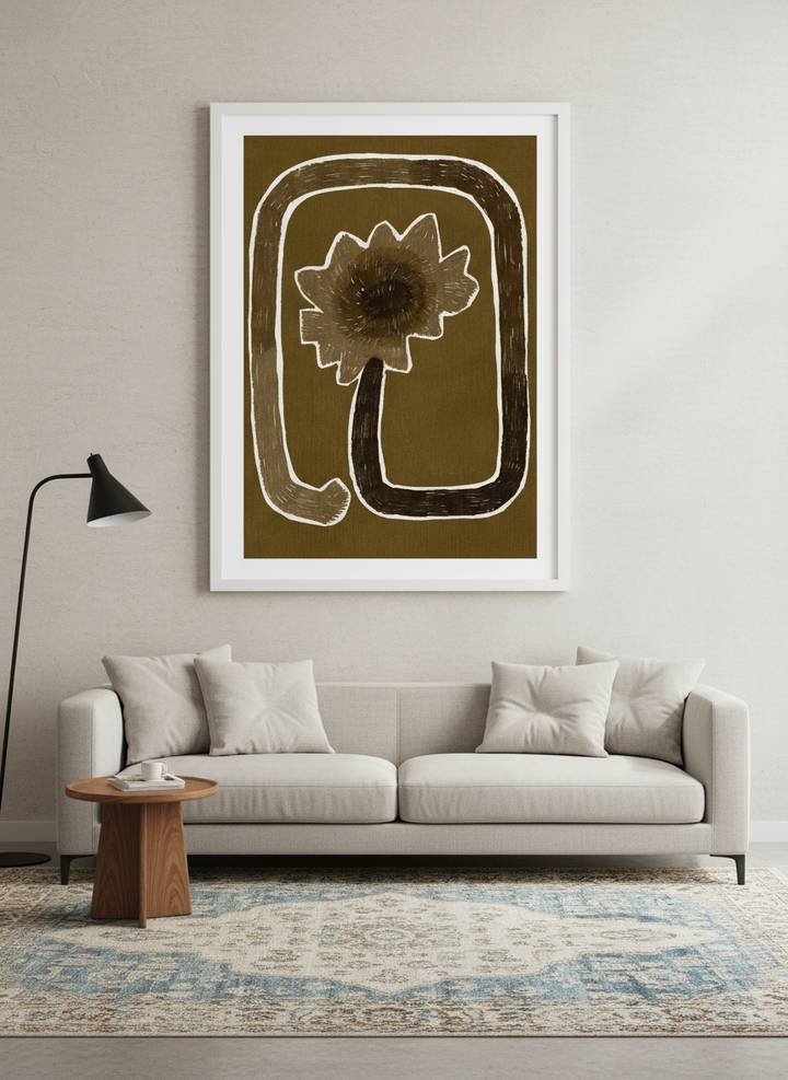 Modern wall art styled above a sofa in a neutral living room