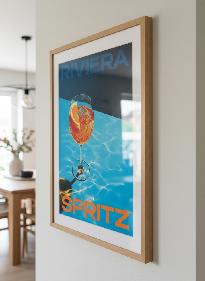 Wall art styled above a dining table in a contemporary home