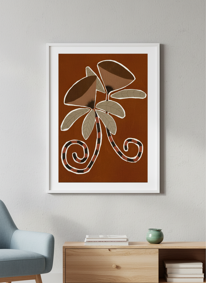 Modern wall art styled above a sofa in a neutral living room