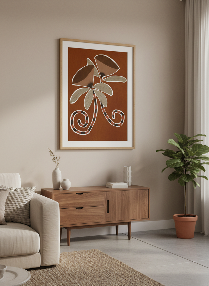 Modern wall art styled above a sofa in a neutral living room