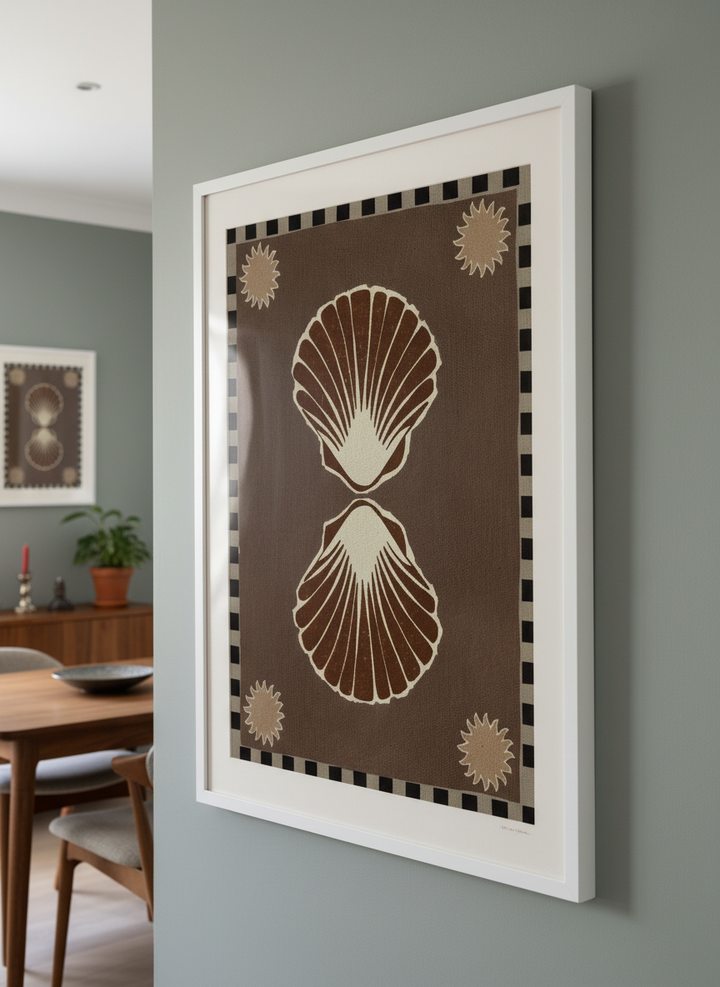 Wall art styled above a dining table in a contemporary home