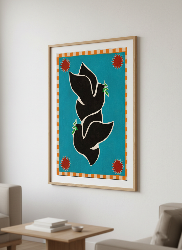 Modern wall art styled above a sofa in a neutral living room