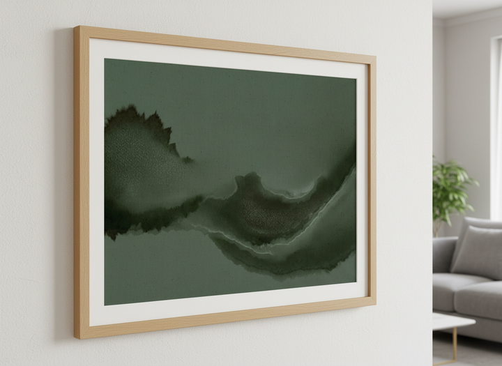 Modern wall art styled above a sofa in a neutral living room