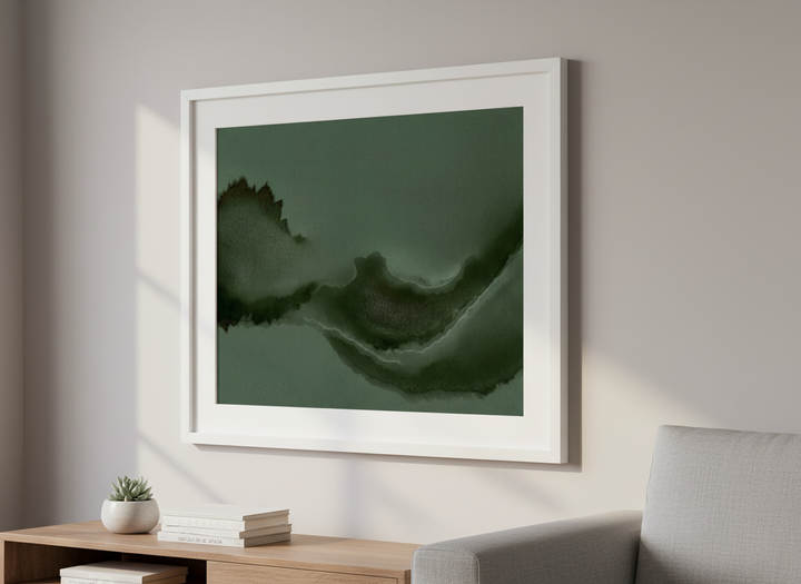 Modern wall art styled above a sofa in a neutral living room