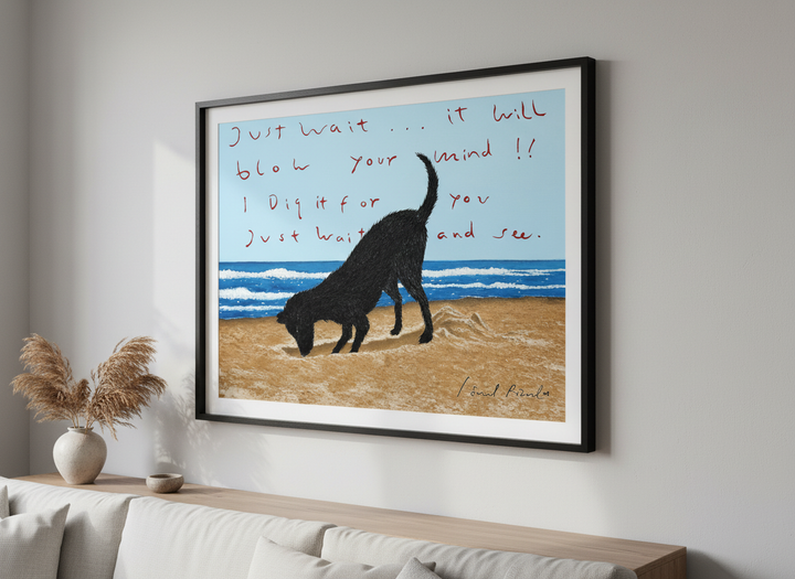 Modern wall art styled above a sofa in a neutral living room