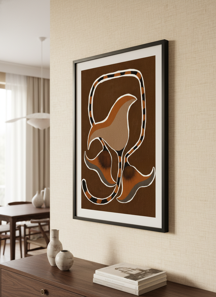 Wall art styled above a dining table in a contemporary home
