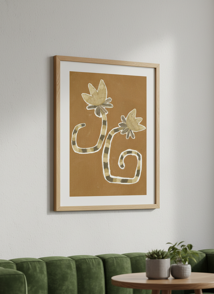 Modern wall art styled above a sofa in a neutral living room