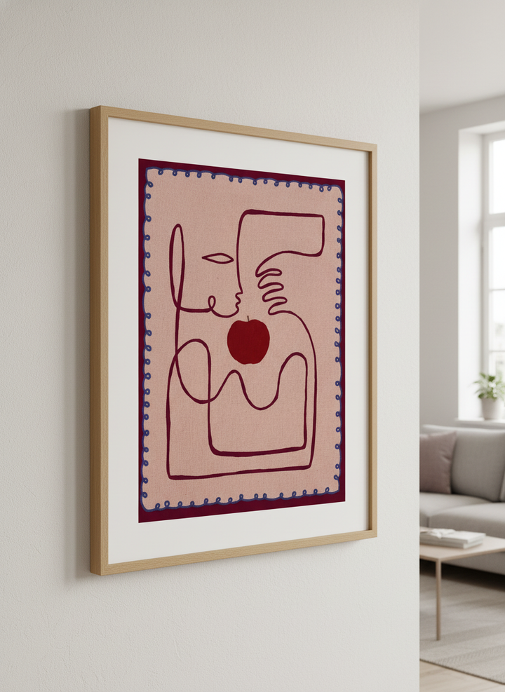 Modern wall art styled above a sofa in a neutral living room