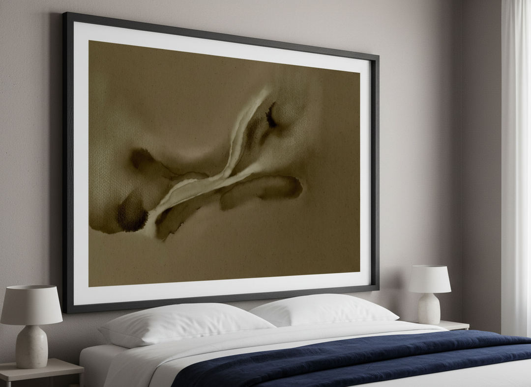Minimalist artwork displayed in a calm, light-filled bedroom interior