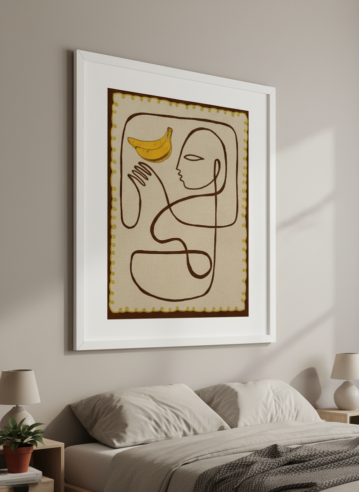 Minimalist artwork displayed in a calm, light-filled bedroom interior
