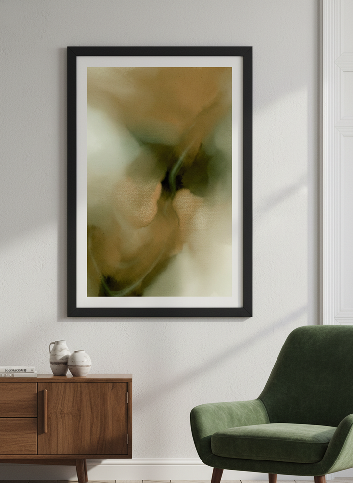 Modern wall art styled above a sofa in a neutral living room