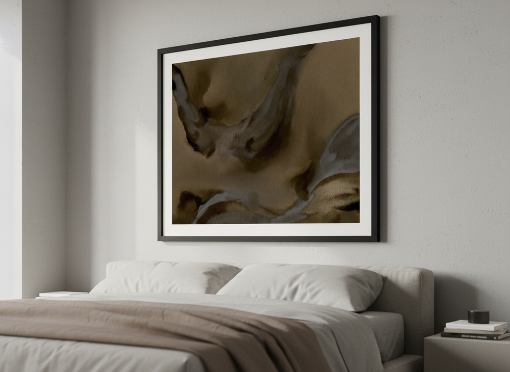 Minimalist artwork displayed in a calm, light-filled bedroom interior