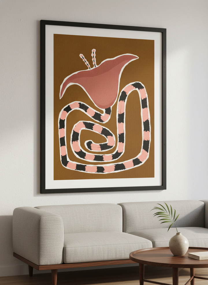 Modern wall art styled above a sofa in a neutral living room
