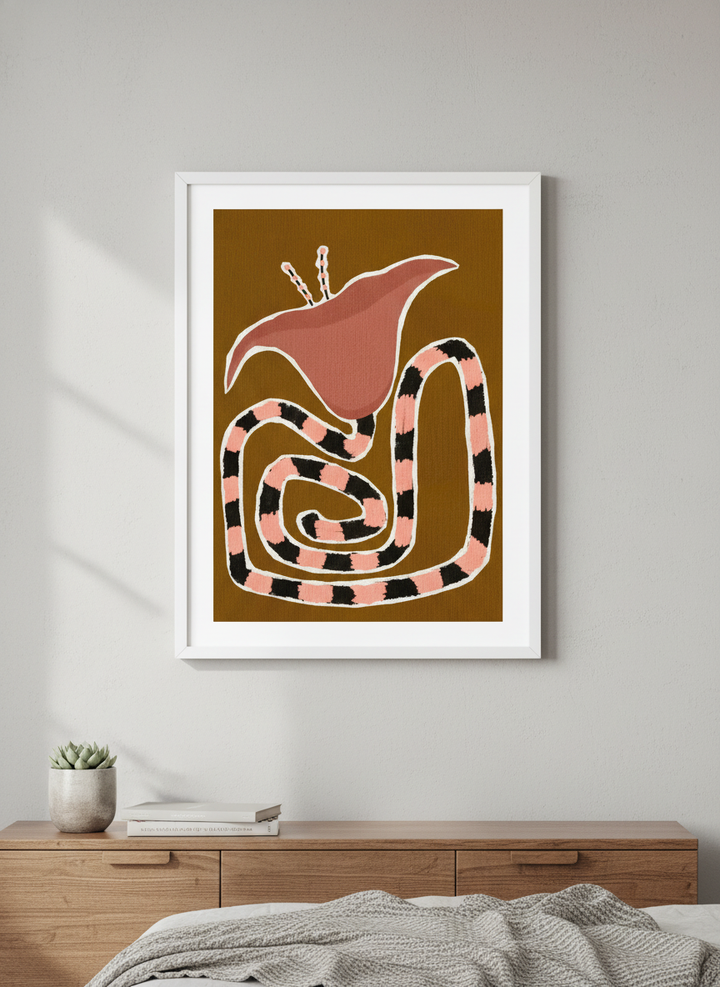 Minimalist artwork displayed in a calm, light-filled bedroom interior
