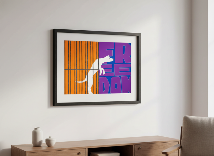 Modern wall art styled above a sofa in a neutral living room
