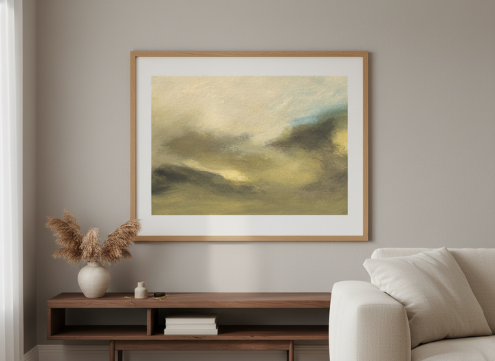 Modern wall art styled above a sofa in a neutral living room