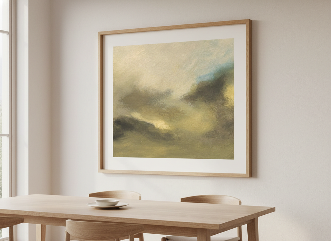 Wall art styled above a dining table in a contemporary home