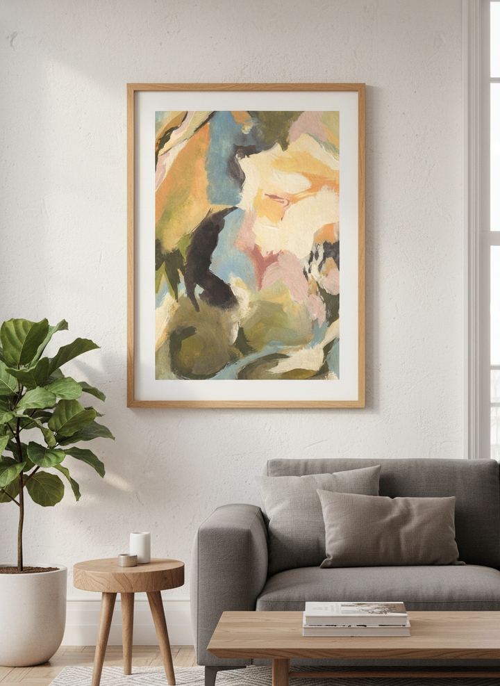Modern wall art styled above a sofa in a neutral living room