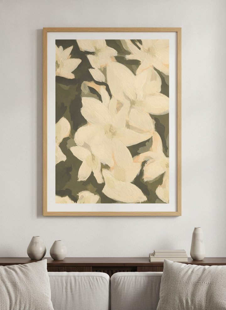 Modern wall art styled above a sofa in a neutral living room