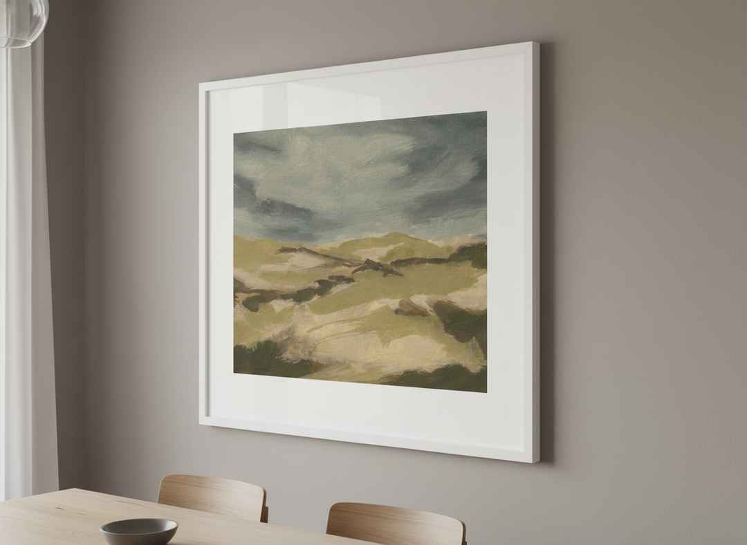 Wall art styled above a dining table in a contemporary home