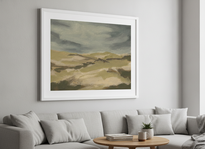 Modern wall art styled above a sofa in a neutral living room