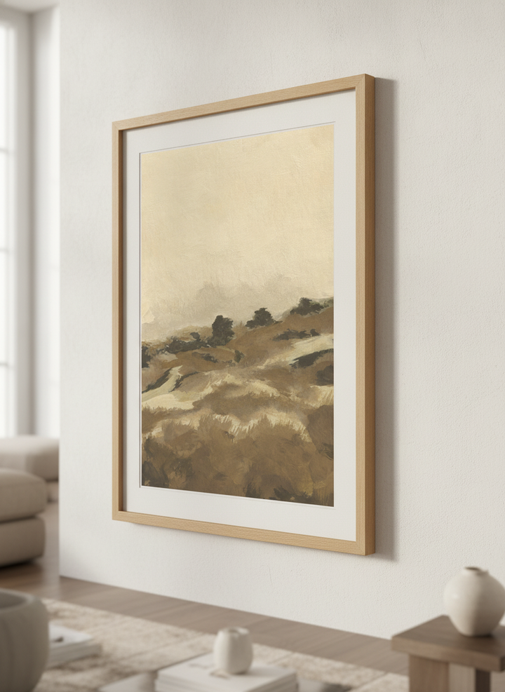 Modern wall art styled above a sofa in a neutral living room