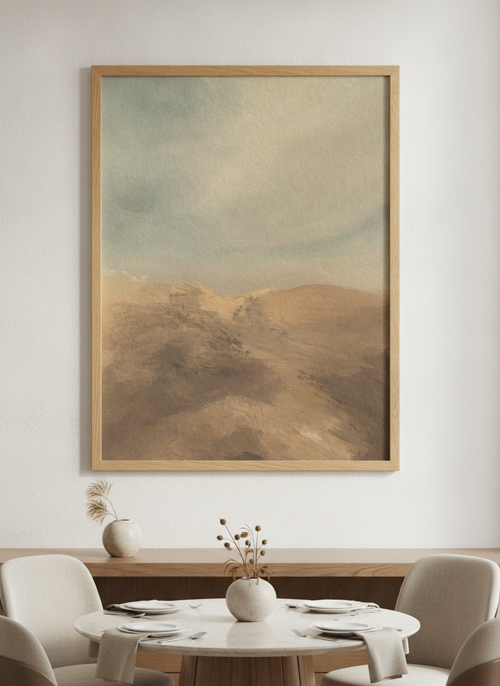 Wall art styled above a dining table in a contemporary home