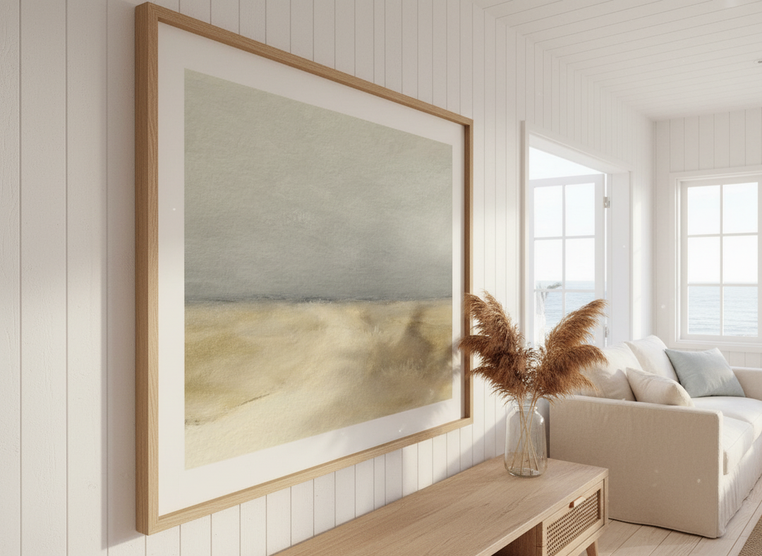 Neutral wall art displayed in a sunny coastal beach house