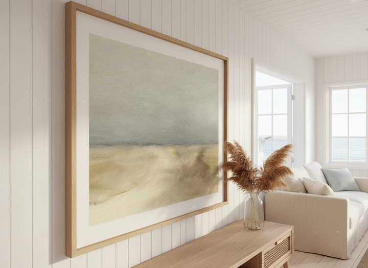 Neutral wall art displayed in a sunny coastal beach house