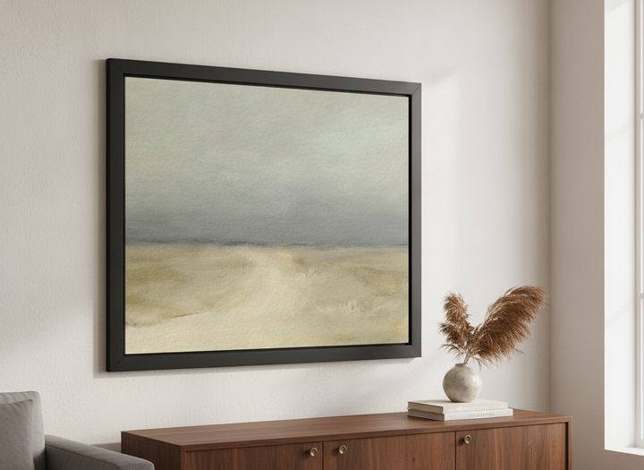 Modern wall art styled above a sofa in a neutral living room