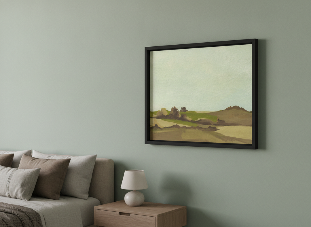 Minimalist artwork displayed in a calm, light-filled bedroom interior