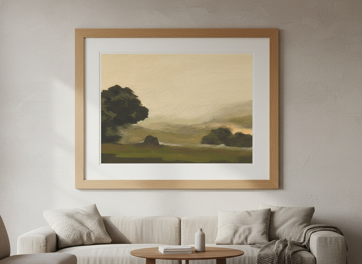 Modern wall art styled above a sofa in a neutral living room