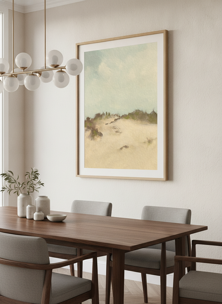 Wall art styled above a dining table in a contemporary home