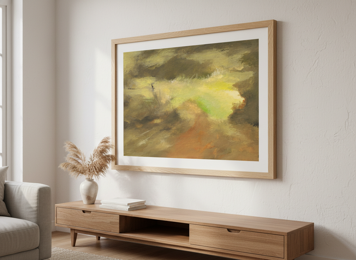Modern wall art styled above a sofa in a neutral living room
