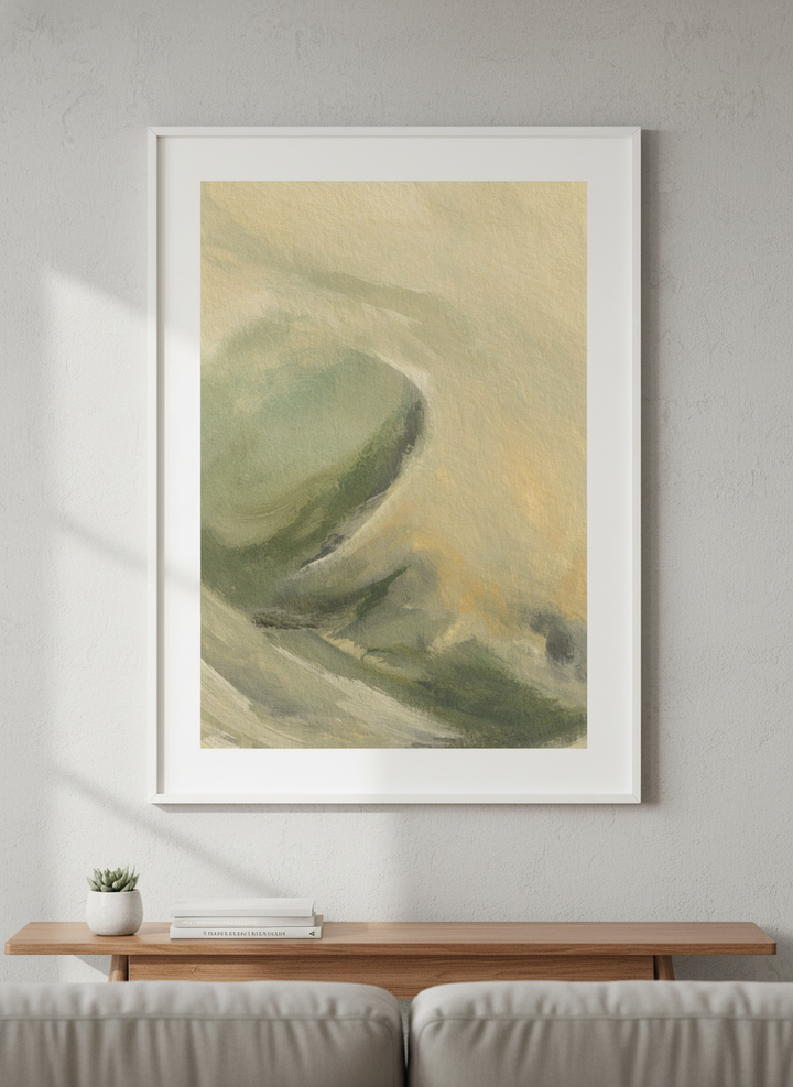 Modern wall art styled above a sofa in a neutral living room