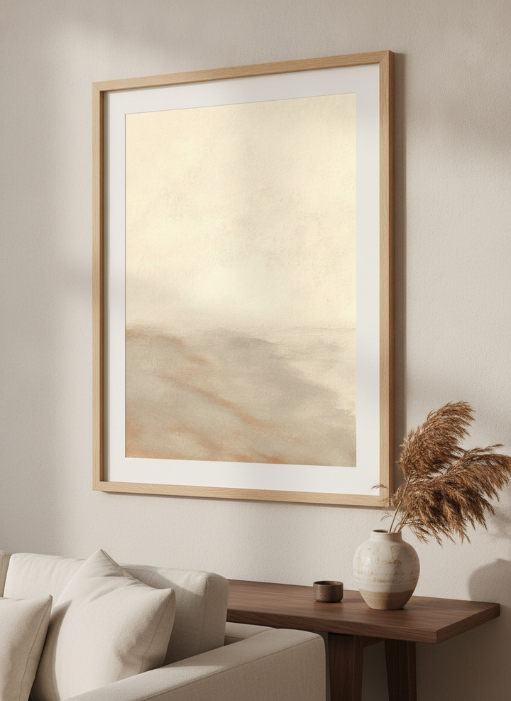 Modern wall art styled above a sofa in a neutral living room