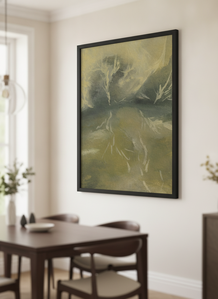 Wall art styled above a dining table in a contemporary home