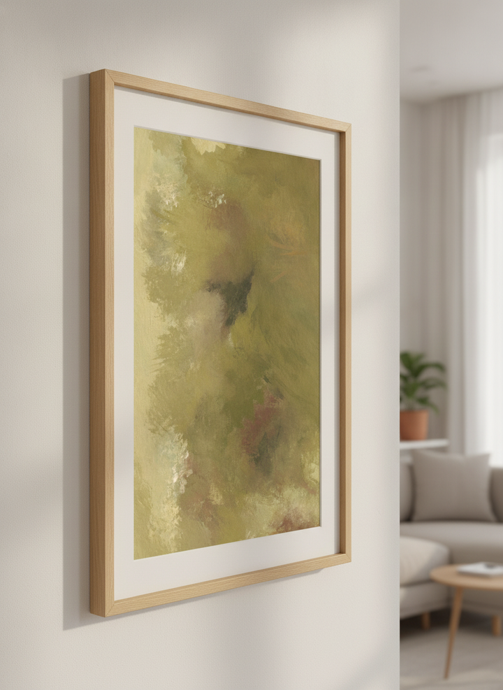 Modern wall art styled above a sofa in a neutral living room