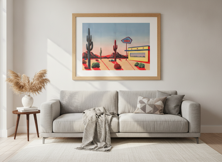 Modern wall art styled above a sofa in a neutral living room