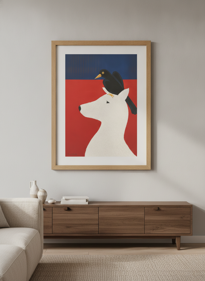 Modern wall art styled above a sofa in a neutral living room