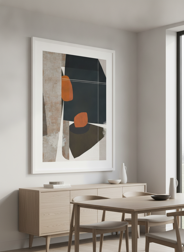 Wall art styled above a dining table in a contemporary home